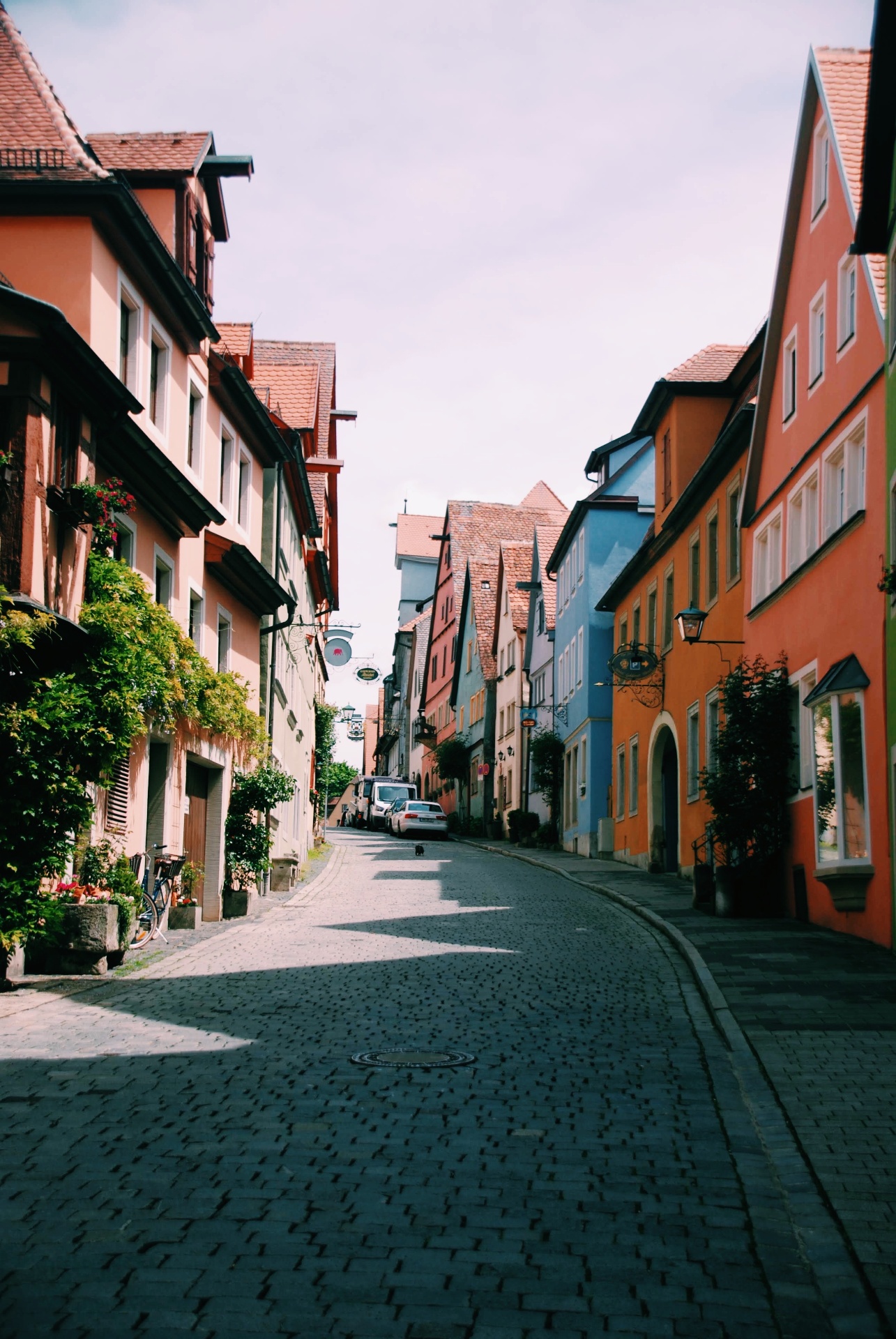 Cobblestone street through a colorful Bavarian village