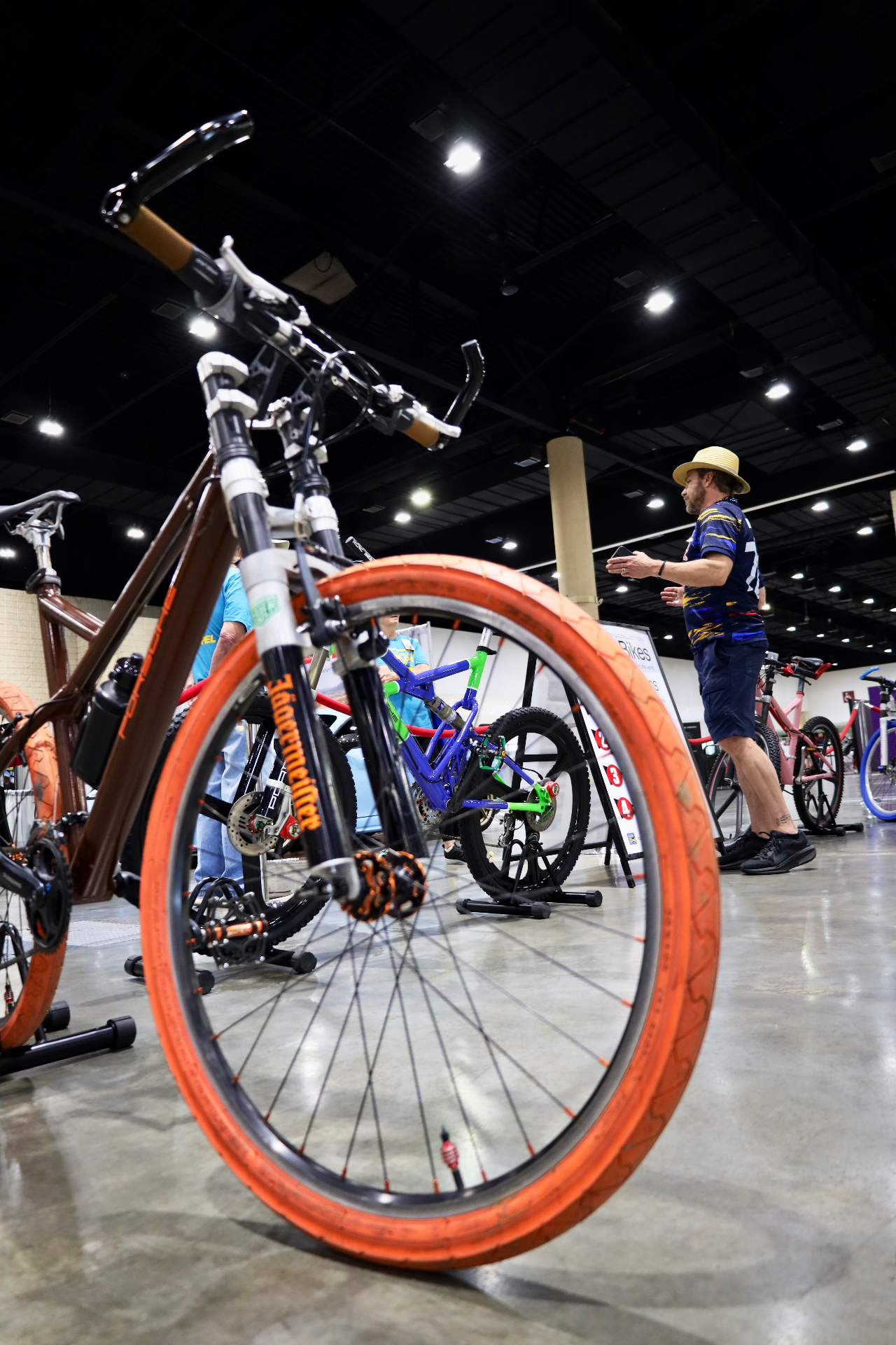 Custom bicycle on display at an indoor expo